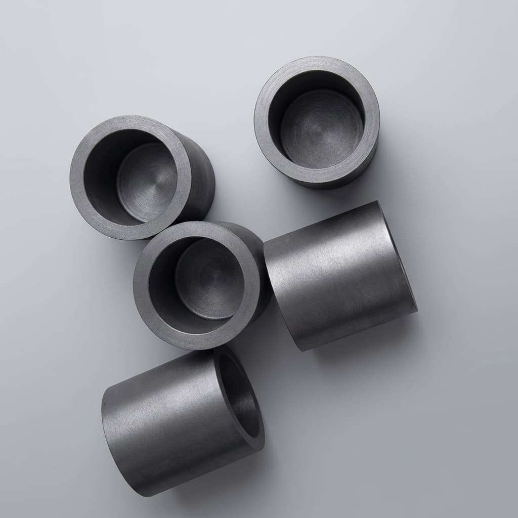 Isostatic graphite crucible body for vacuum furnace and PVT systems